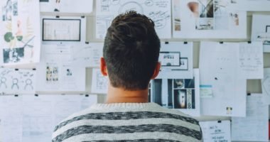 Person looking at planning wall